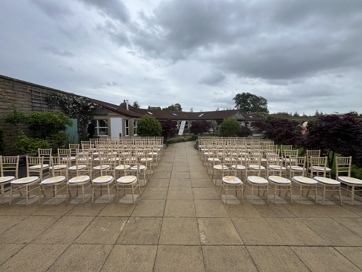 Outdoor wedding ceremony chair setup at Walled Garden Kincardine