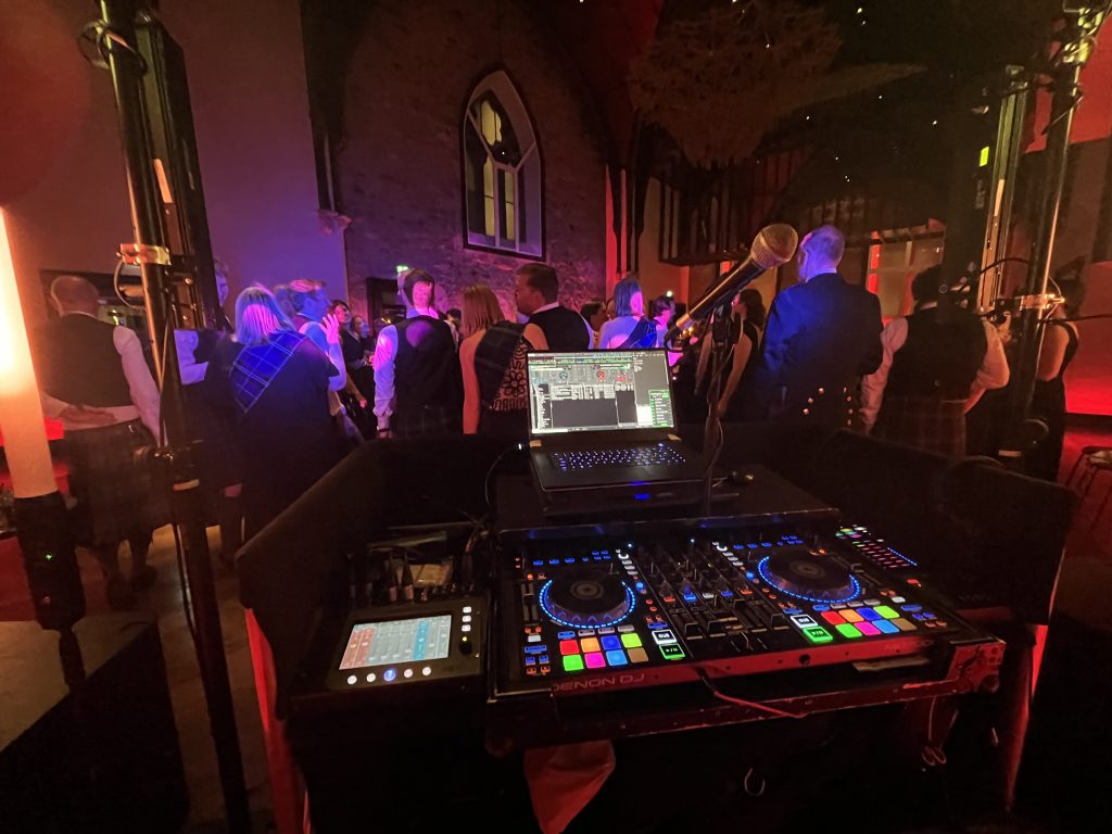 Premier Disco DJ setup at Virgin Hotel Edinburgh corporate event — Denon controller and dance floor
