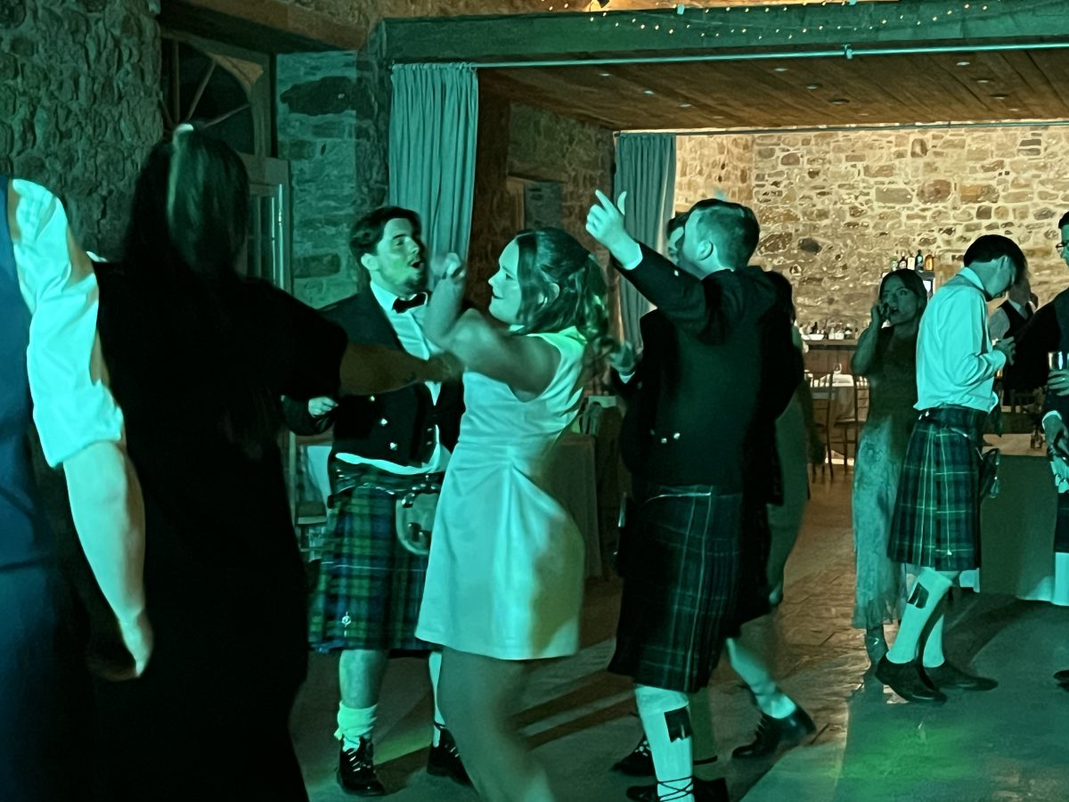 Wedding guests dancing at Colstoun House reception East Lothian