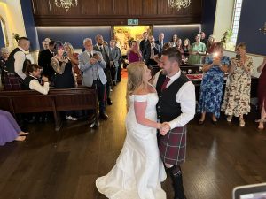 Bride and groom sharing their first dance at The Harbour Chapel Dunbar