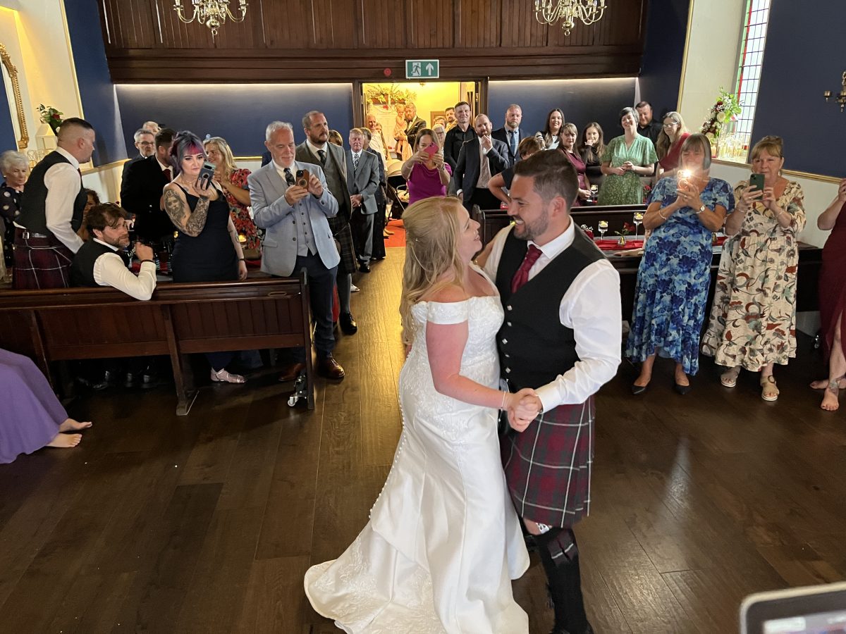 Bride and groom sharing their first dance at The Harbour Chapel Dunbar
