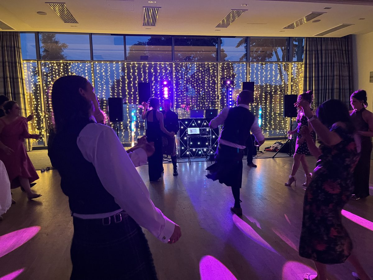Meldrum House Hotel Set Up From Dance floor purple - Premier Disco Scotland DJ set up viewed from the dancefloor under purple lighting at Meldrum House Hotel