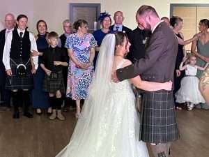 Bride and groom Katie and Ryan sharing their first dance at Meldrum House Hotel