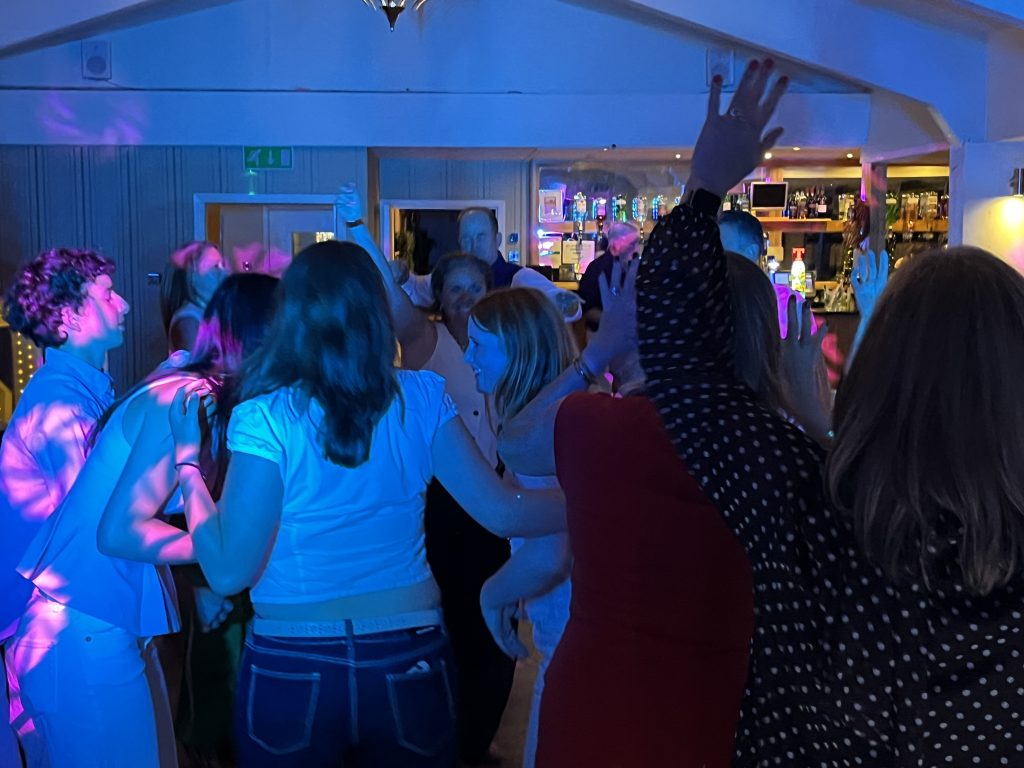 Craigie Hill Golf Club Guests Arms Up Close - Premier Disco Scotland Private party DJ Edinburgh — guests dancing with arms raised at Craigie Hill Golf Club