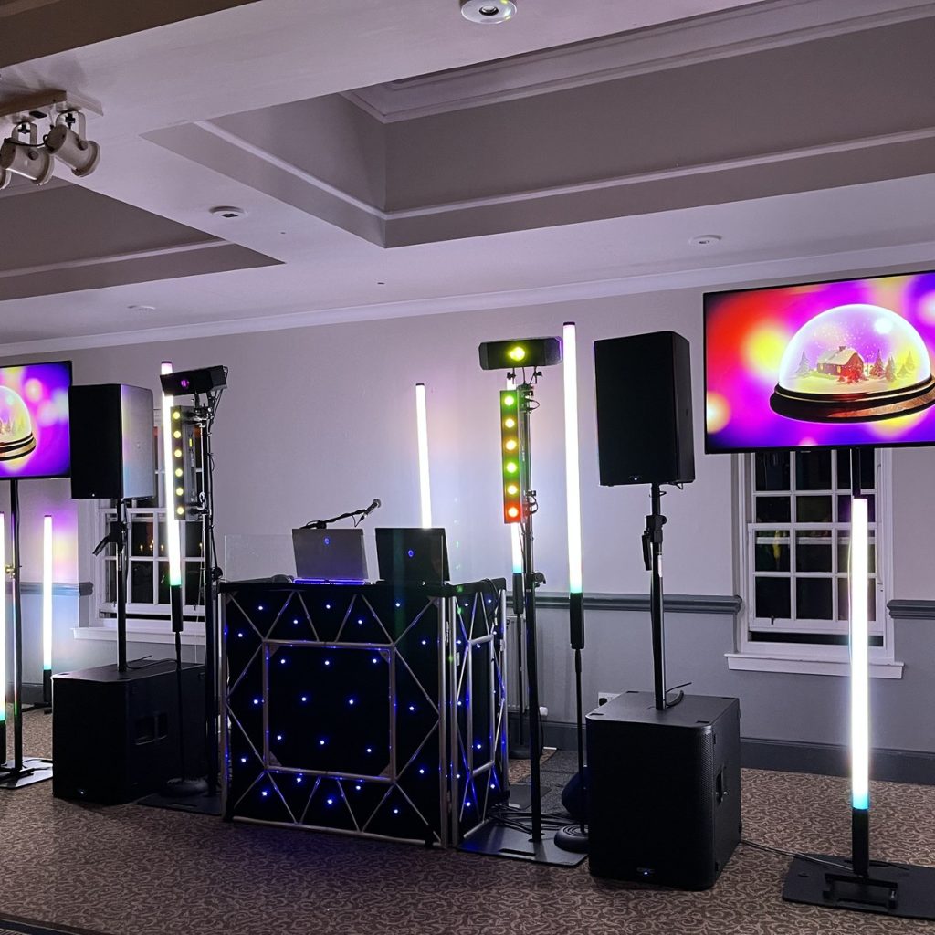 Christmas Party DJ Setup with Festive Screen Visuals - Premier Disco Scotland - Premier Disco Scotland Christmas party DJ Scotland — festive screen visuals and LED lighting at a Premier Disco Christmas party setup