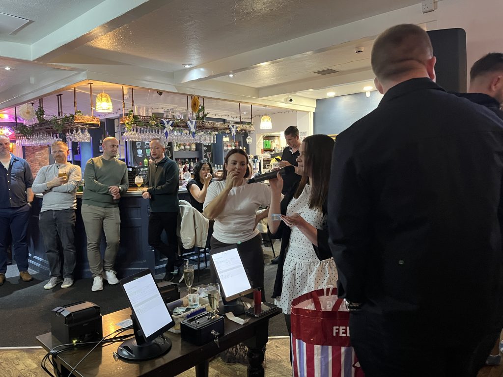 Raffle draw at a Premier Disco race night at the Mid Yoken pub, Edinburgh